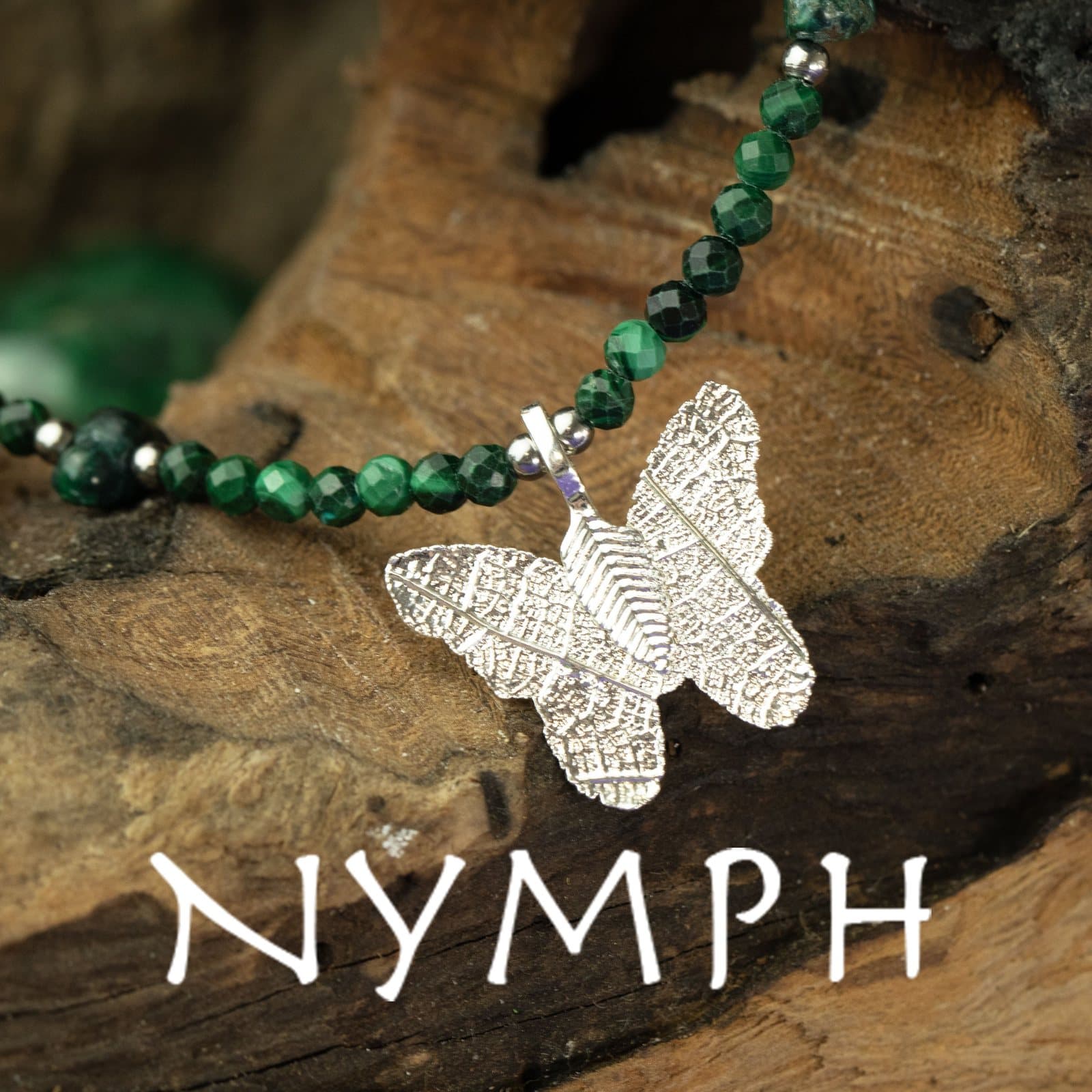 Malachite bead necklace with a silver-plated butterfly leaf pendant on a Nymph card