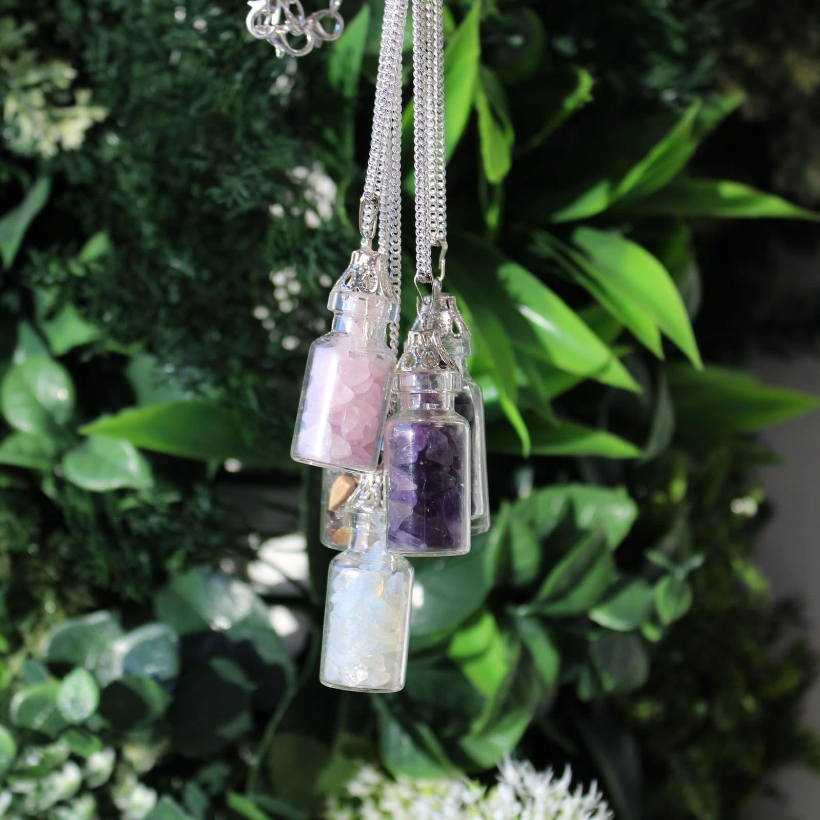 Bottle pendant necklace filled with tiny opalites