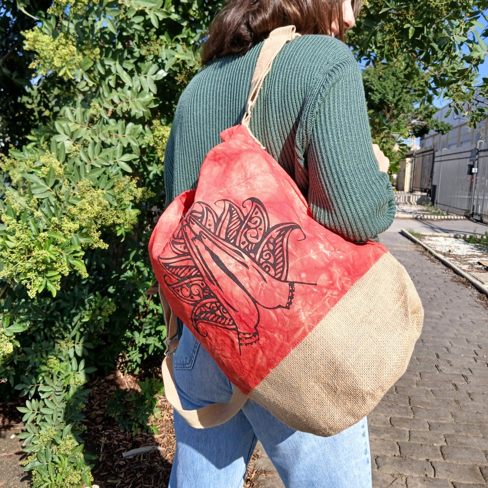 Orange stonewash cotton canvas backpack with Namaste Hand symbol