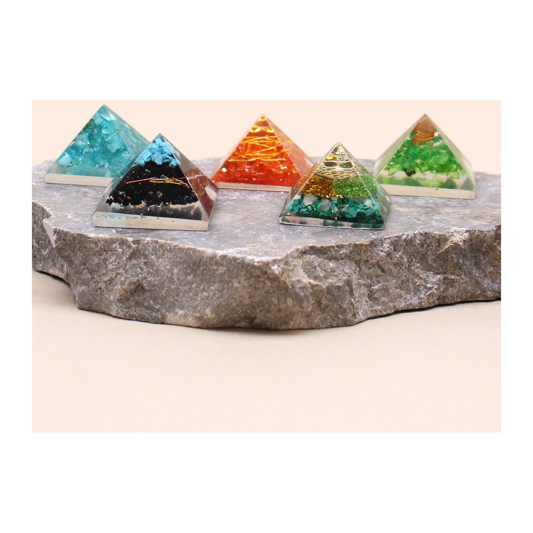 Orgonite pyramids and wands made with gem chips and copper