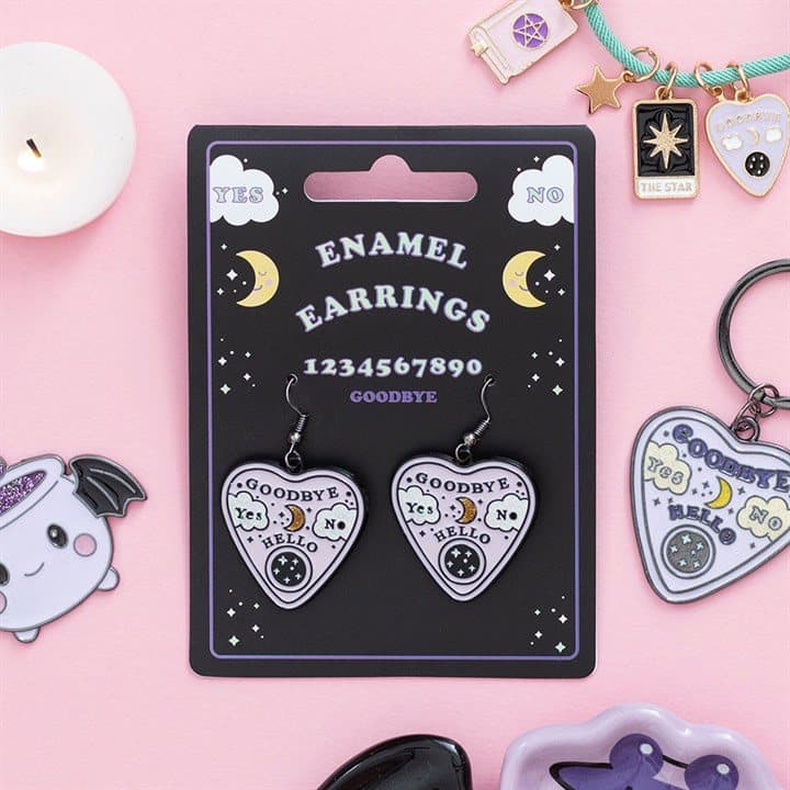 Pastel talking board planchette earrings with celestial details