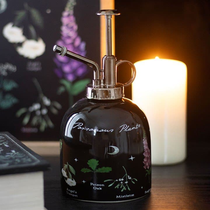 Ceramic plant mister decorated with a poisonous plants design