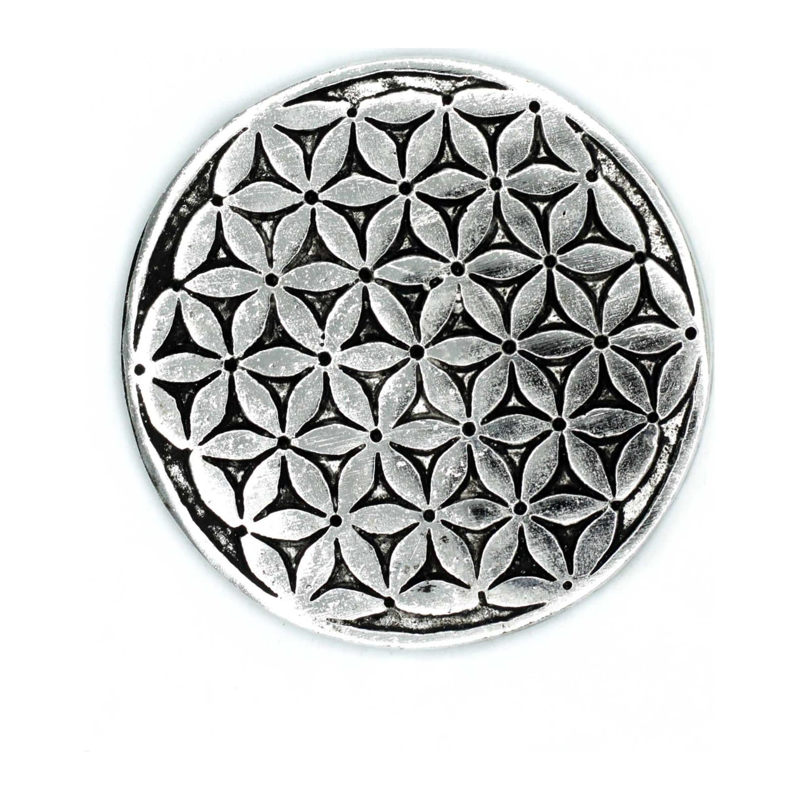 Polished aluminium incense holder with a Flower of Life design