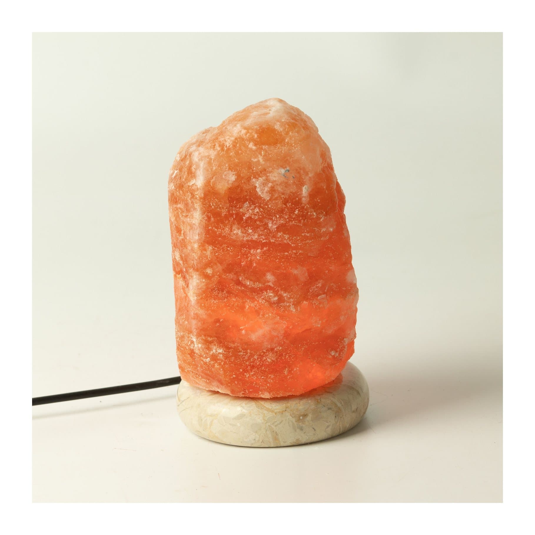 Single natural Himalayan salt lamp with USB connector