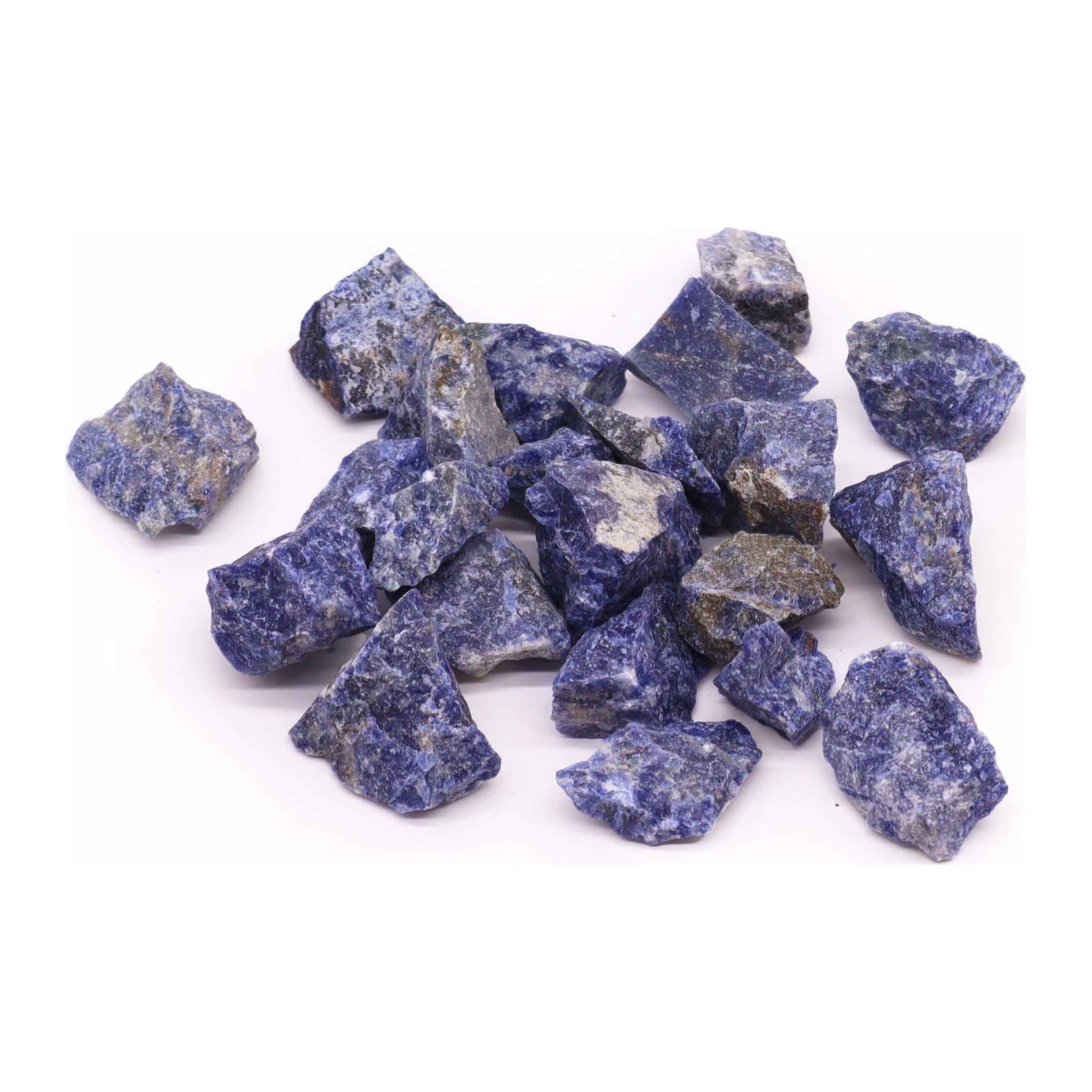 Raw sodalite crystals in deep blue with white veining, mixed shapes and sizes