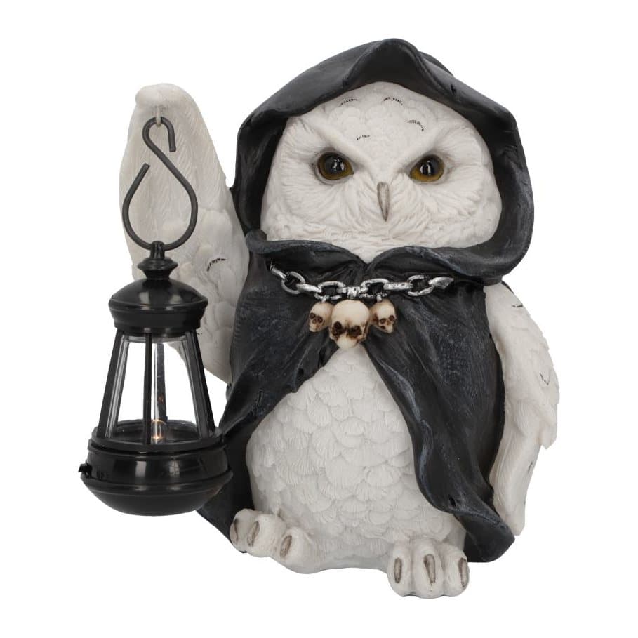 Snowy owl figurine in a black cloak gripping a lantern