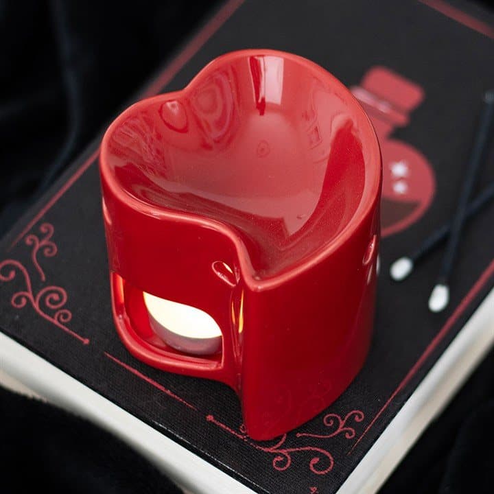 Heart-shaped oil burner and wax warmer in red and black