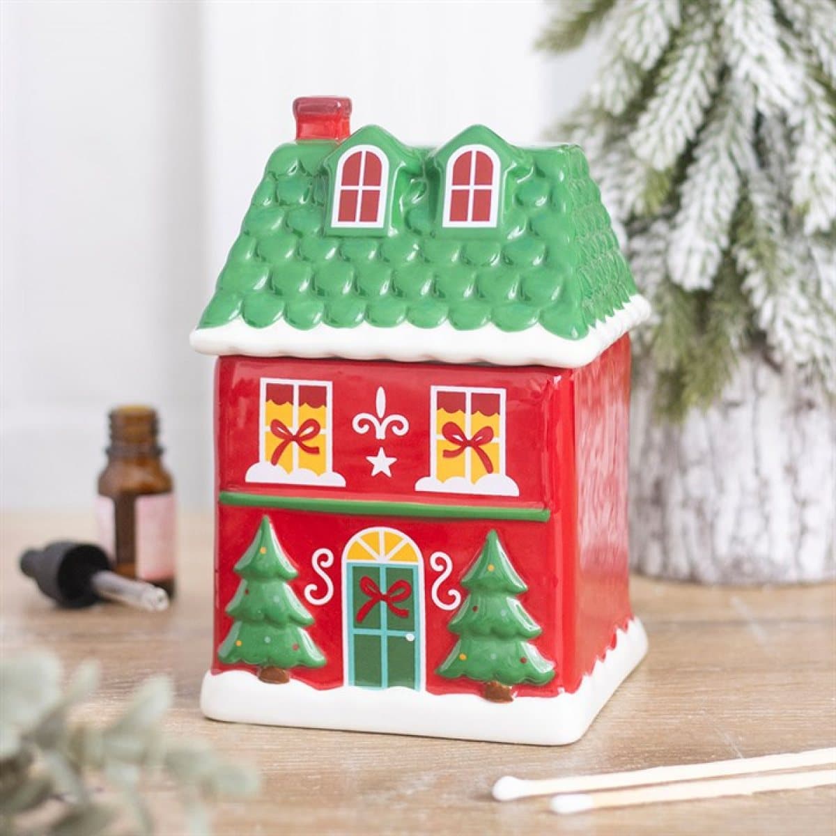 Red ceramic Christmas house oil burner with a removable roof lid