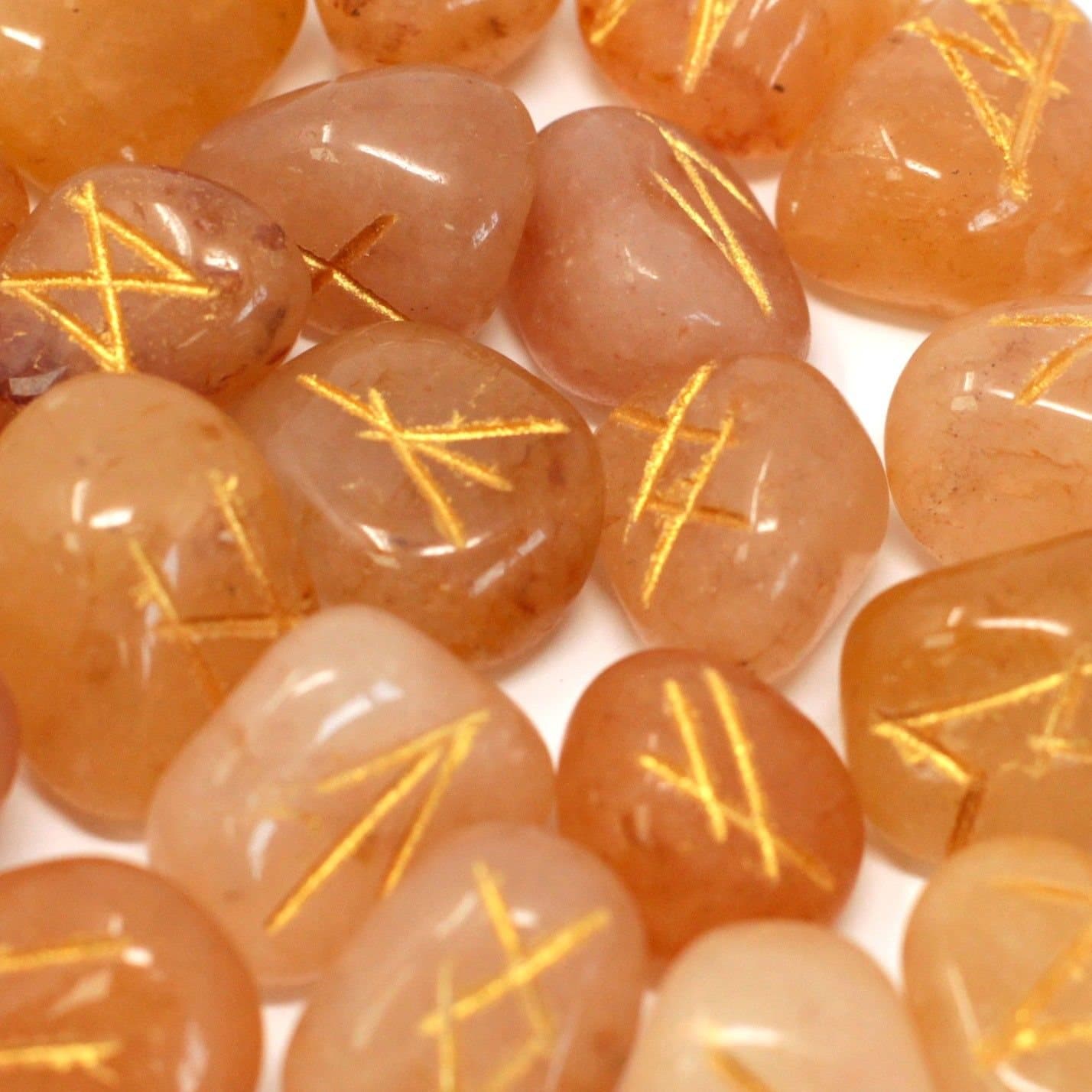 Set of aventurine rune stones with a pouch