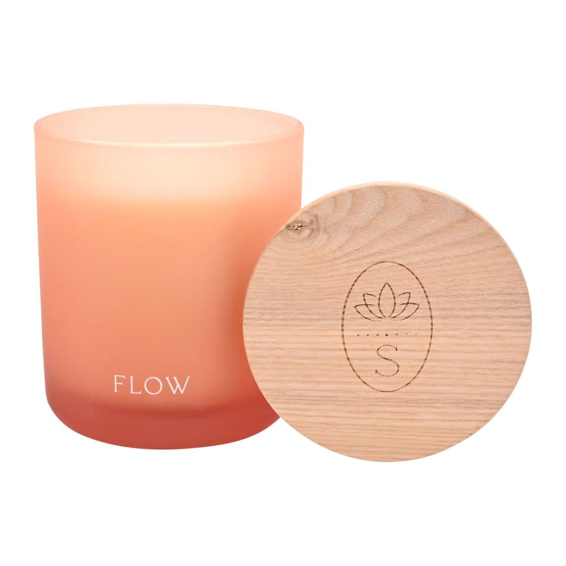 Ombre glass scented candle adorned with the word FLOW