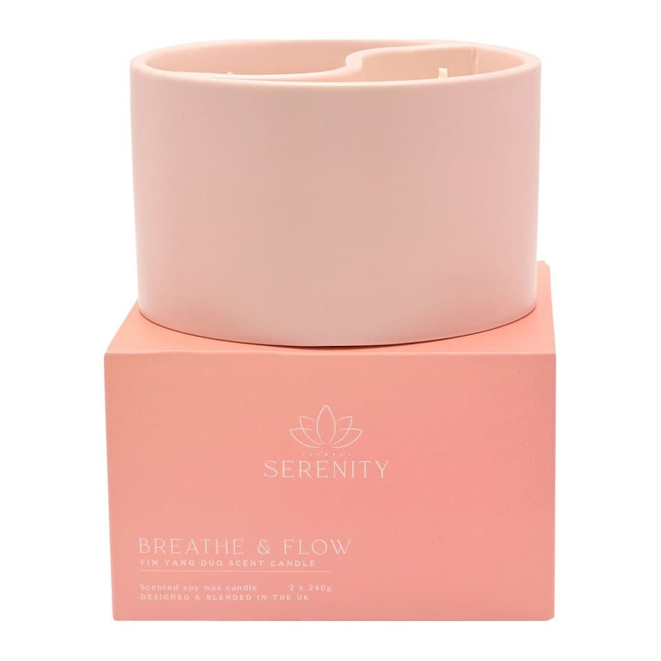 Yin Yan ceramic candle beside its branded box