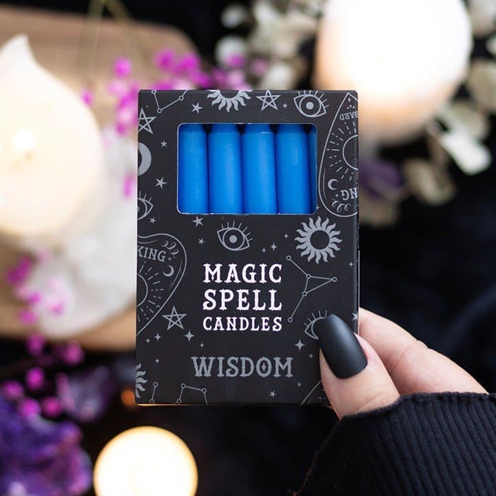 Pack of 12 dark blue wisdom spell candles in a picture box