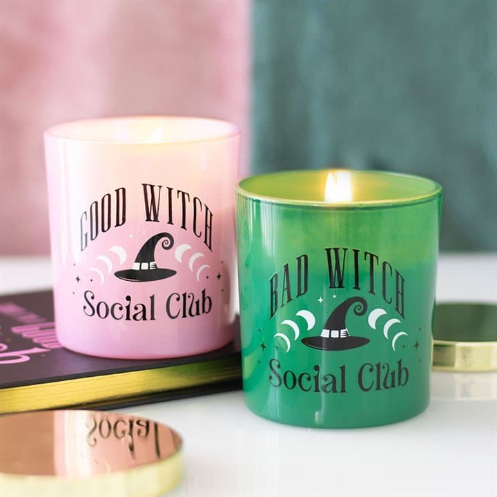 Set of two Good Witch and Bad Witch scented glass candles with witch designs