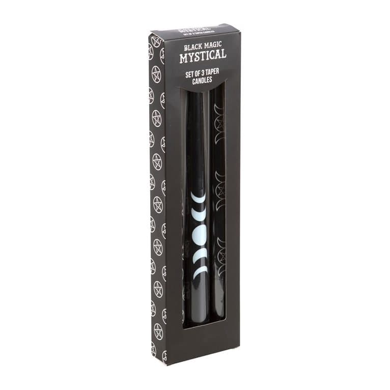 Three black taper candles with pentagram and moon designs