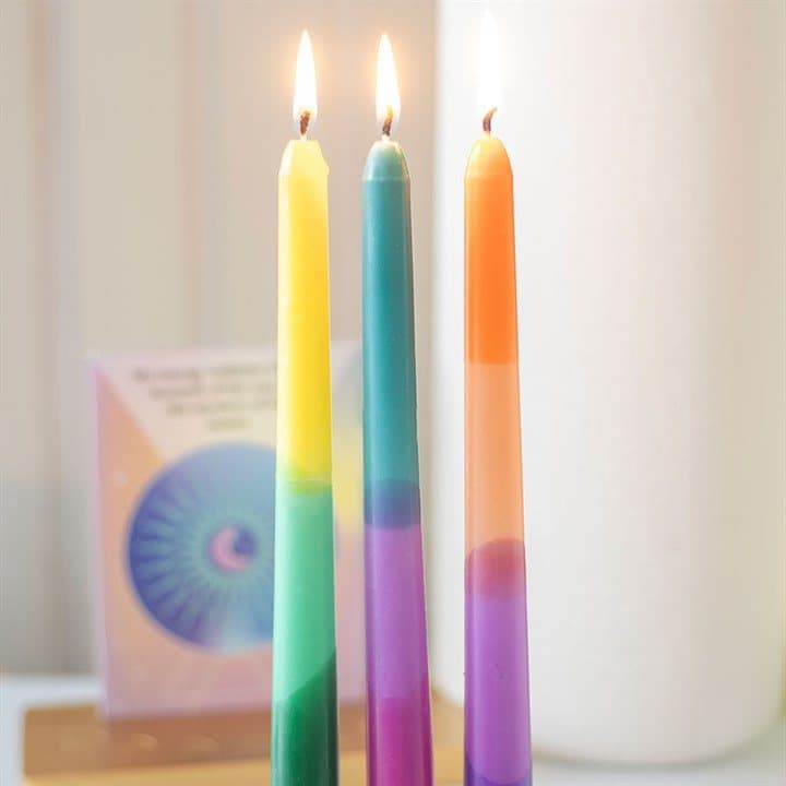 Set of three dipped taper candles in a windowed box