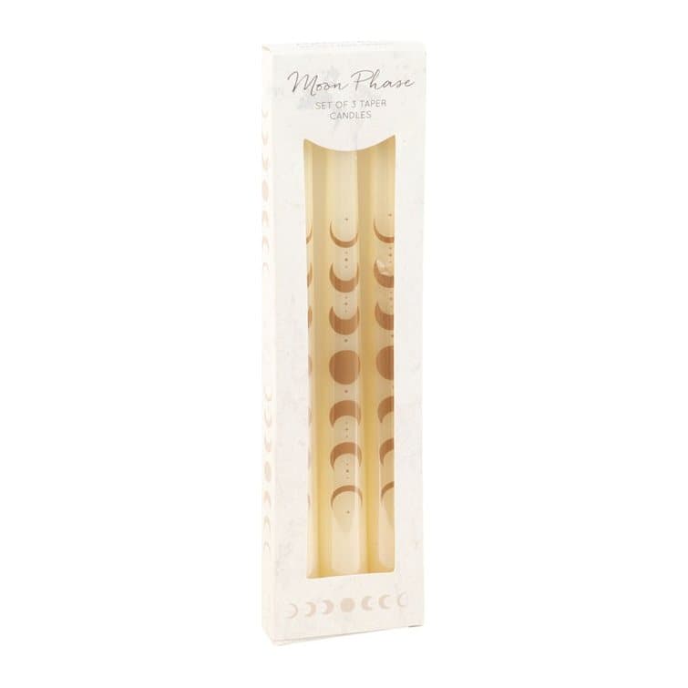 Three off white taper candles with a moon phases design