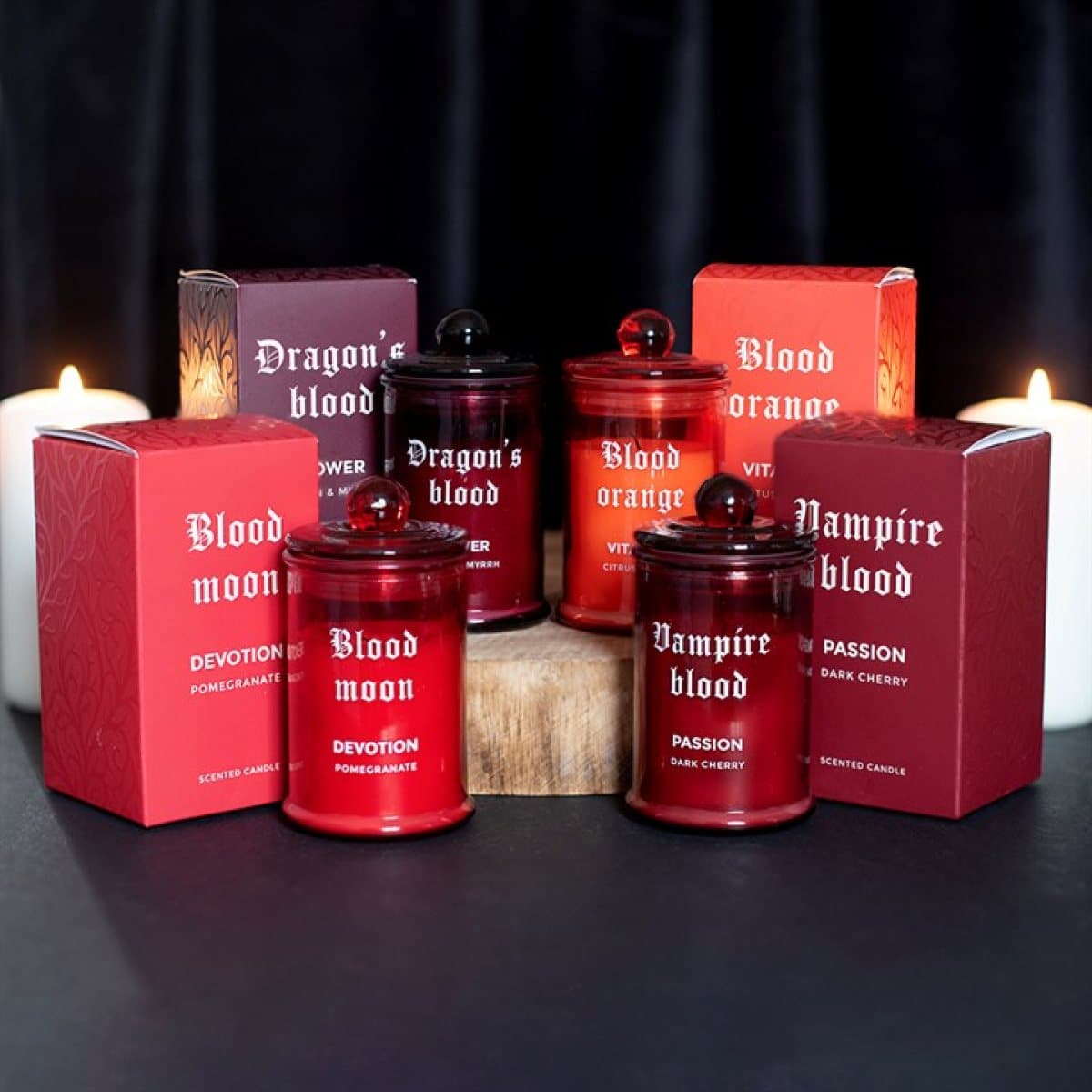 Set of four scented glass candles in a colour cardboard box