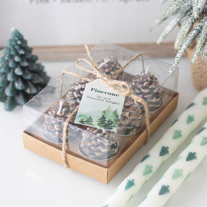 Set of six pinecone-shaped tealight candles