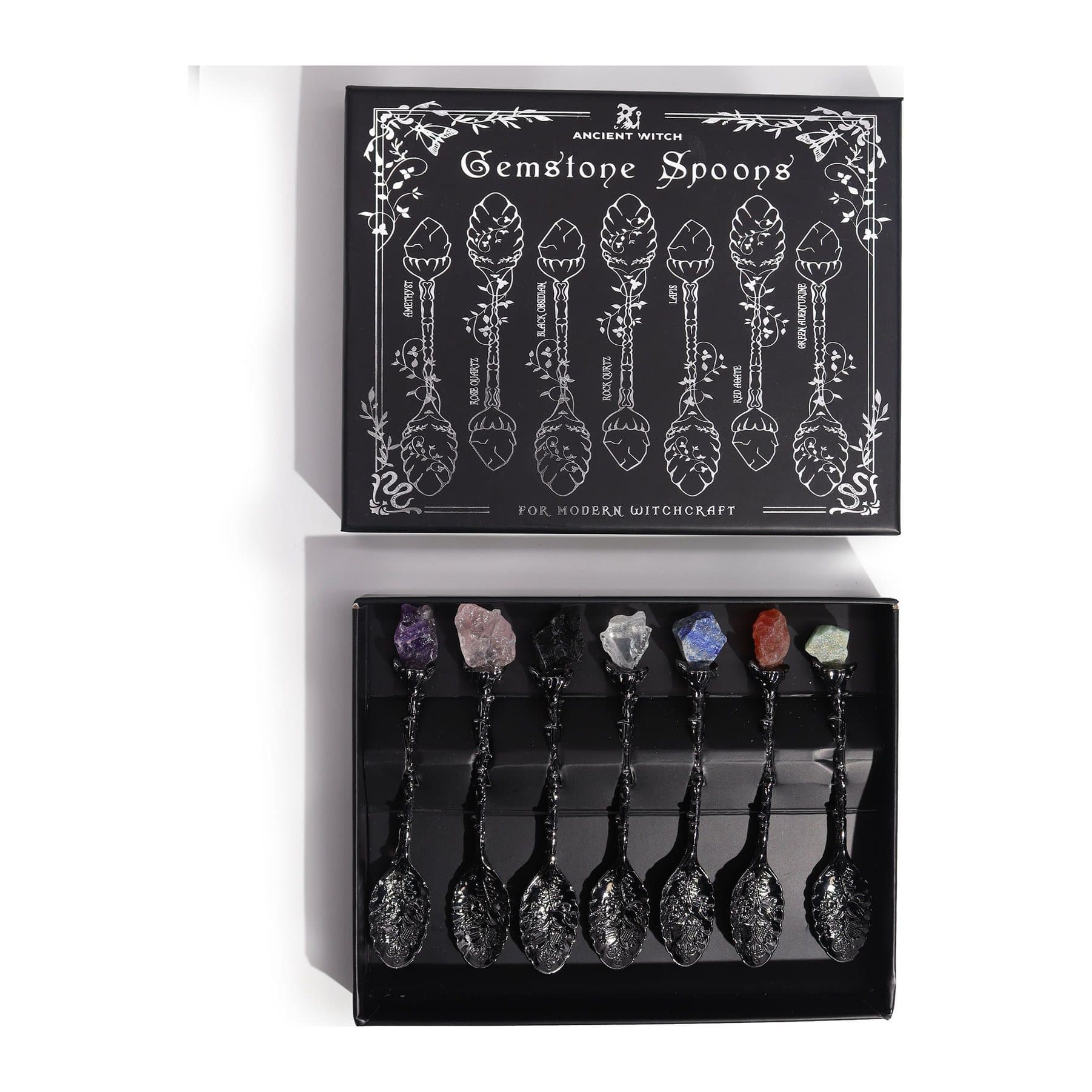 Set of seven dark silver witch spoons set with coloured gemstones