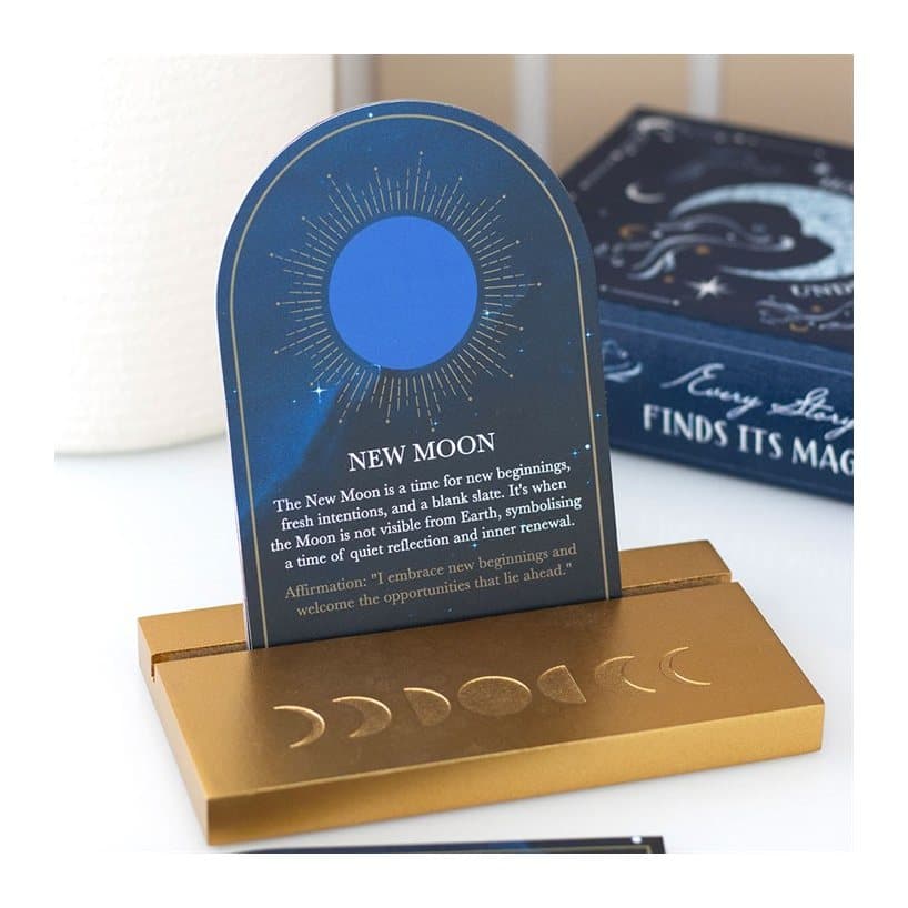 Boxed set of moon phase cards with a wooden display stand
