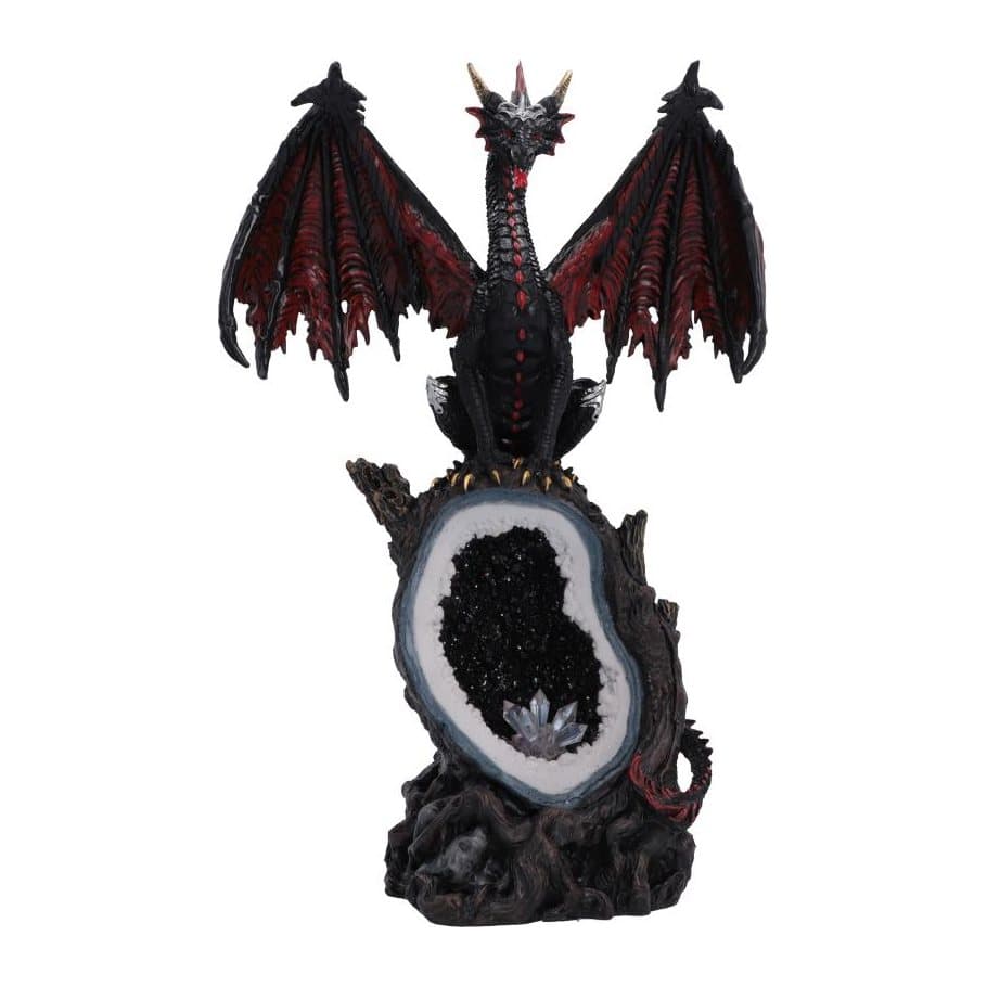 Black and red dragon figurine standing on an open geode crystal