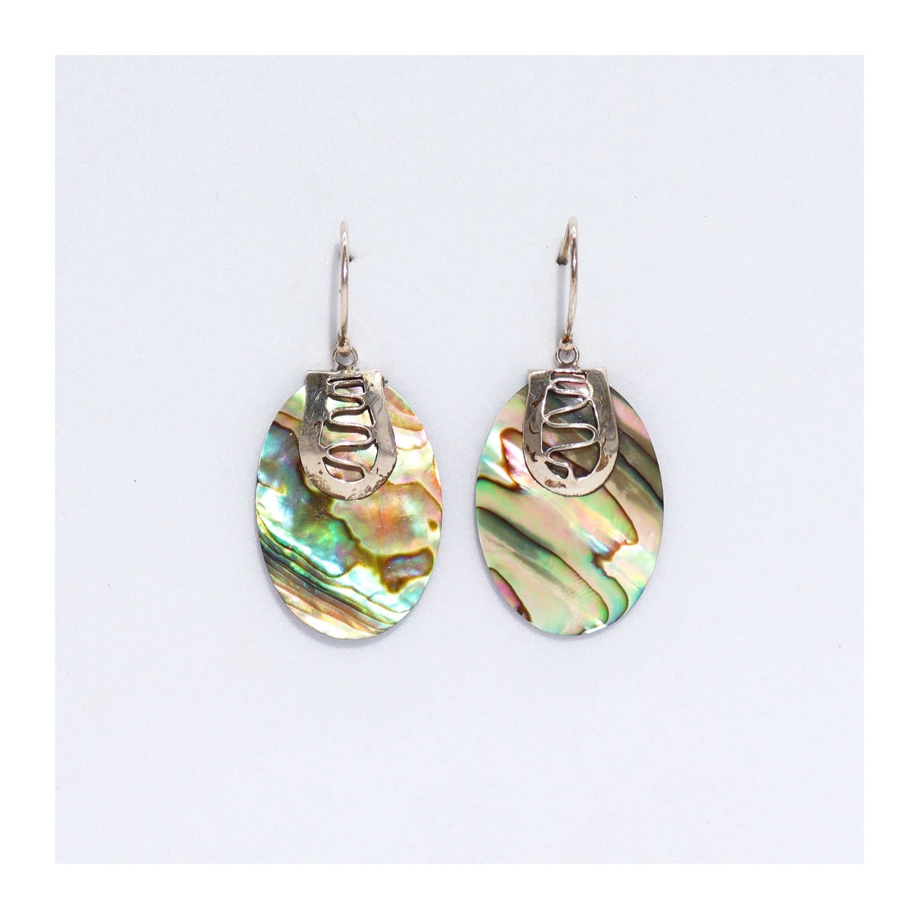 Abalone shell and silver earrings on a header card