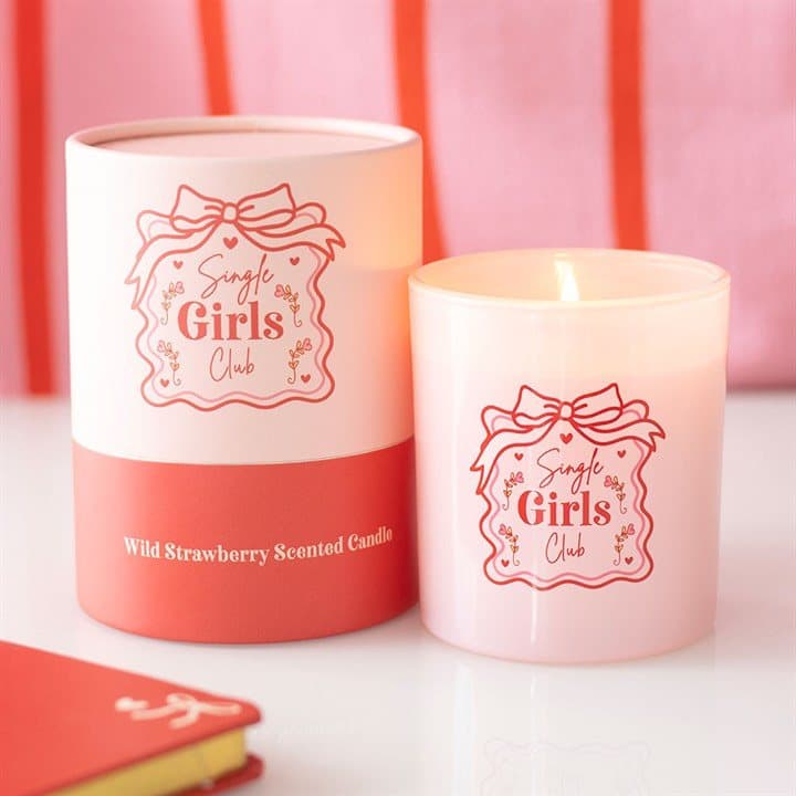 Single Girls Club candle in a pink glass jar