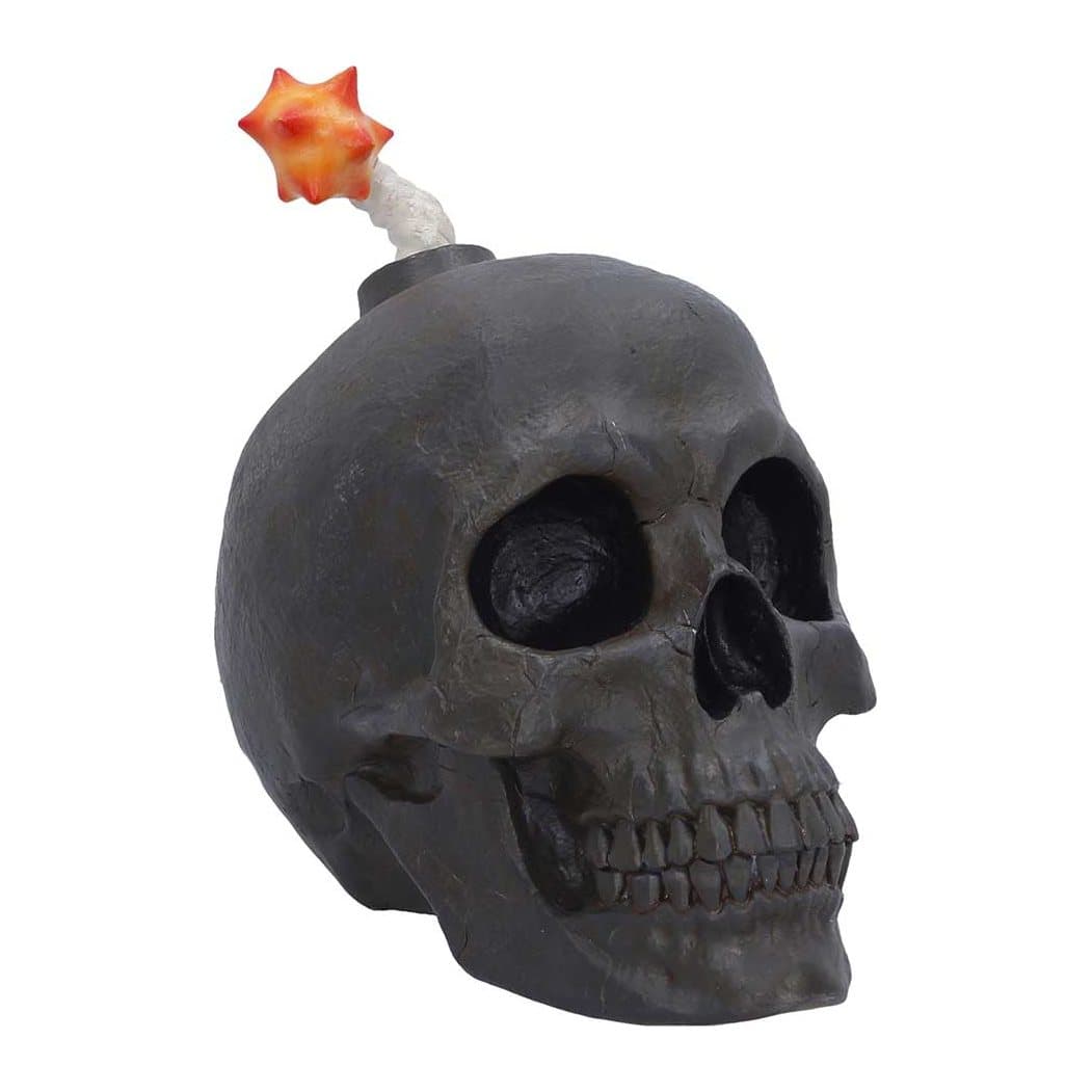 Black resin skull figurine shaped like a bomb with a lit fuse on top
