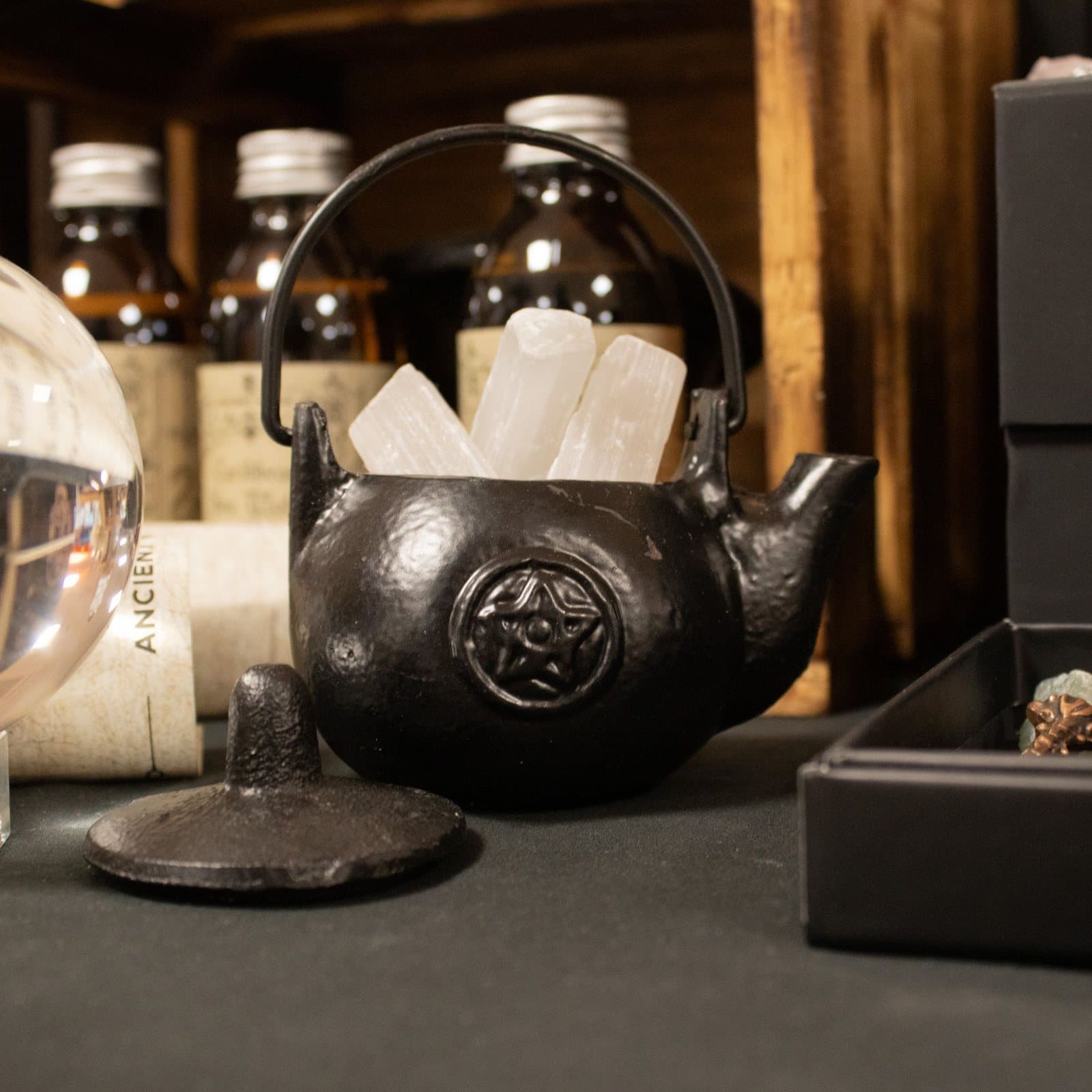Small black cast iron ritual pot with lid, side handle and pentagram detail