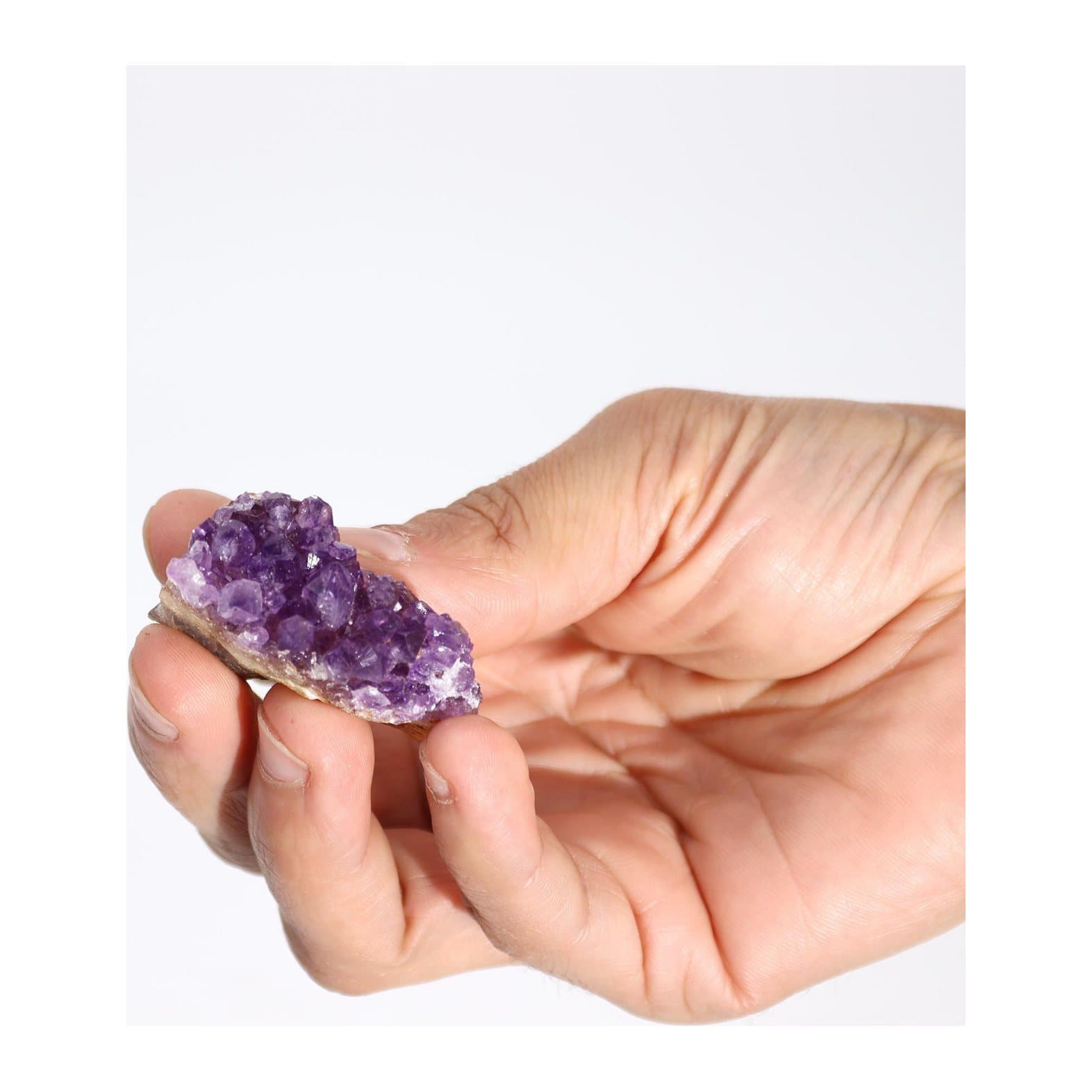 Small natural purple amethyst crystal cluster
