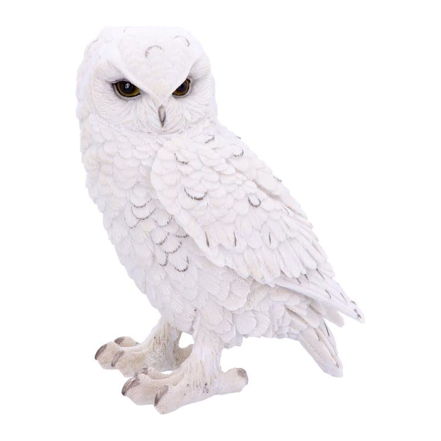 Large white Snowy Owl ornament with wings tucked in, looking over its shoulder