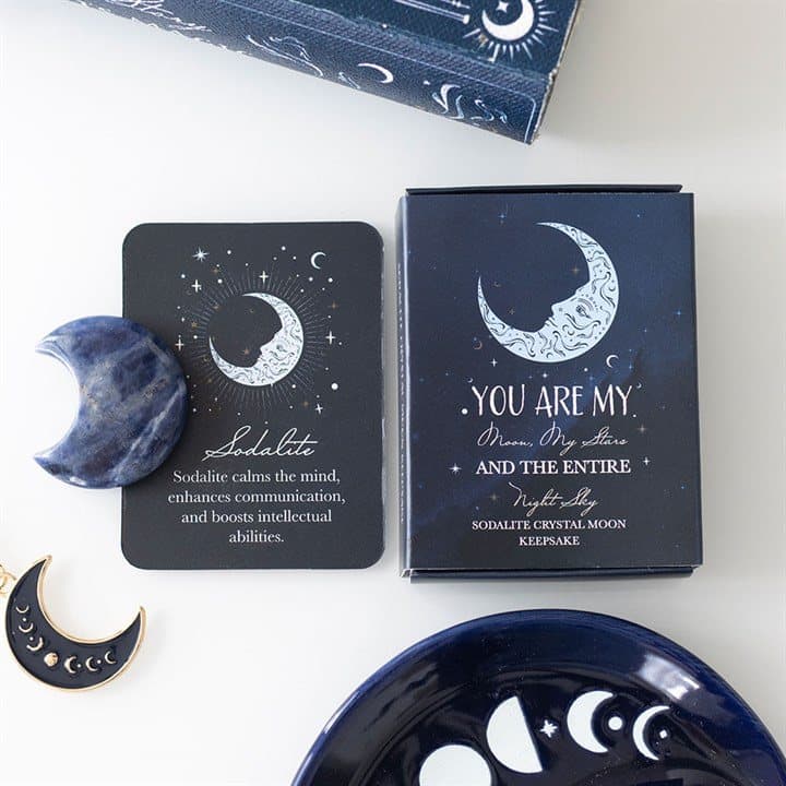 Polished sodalite moon crystal in a matching celestial box