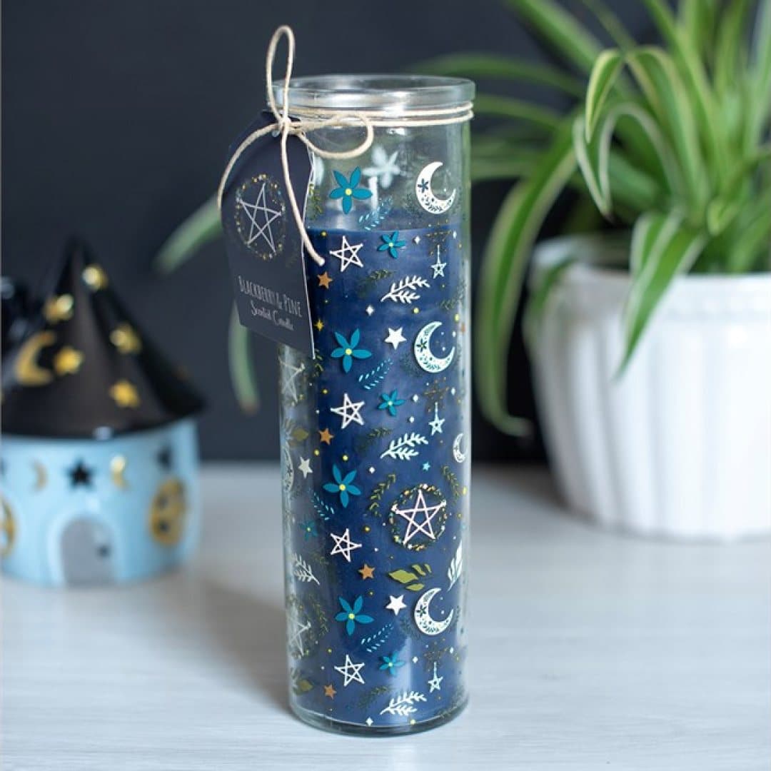 Deep blue illustrated Solstice Spell tube candle in Blackberry & Pine scent