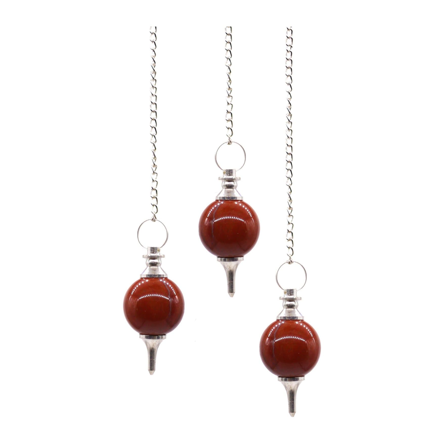 Red jasper sphere pendulum hanging from a silver-plated chain