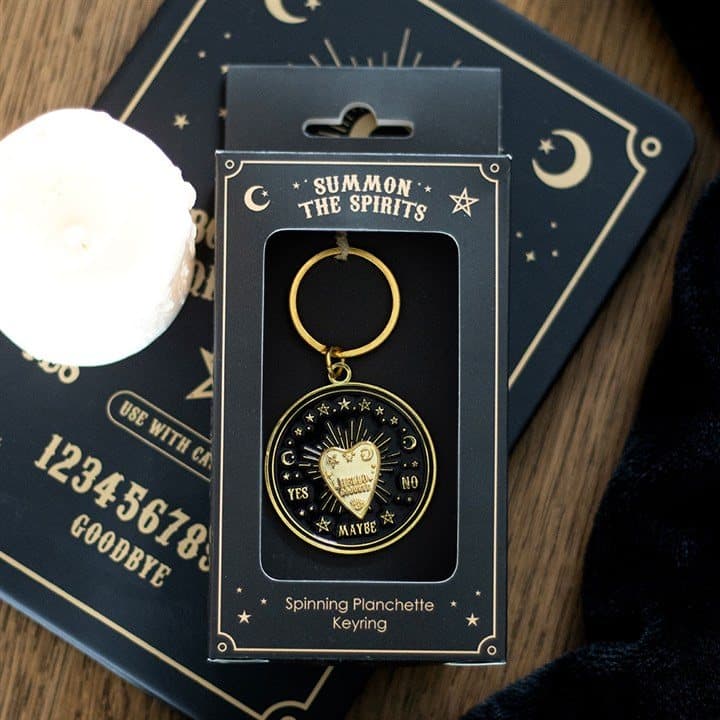 Gold-tone talking board planchette keyring charm