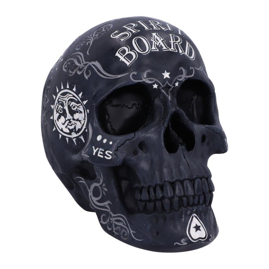 Black resin skull ornament with a spirit board design and white baroque detail