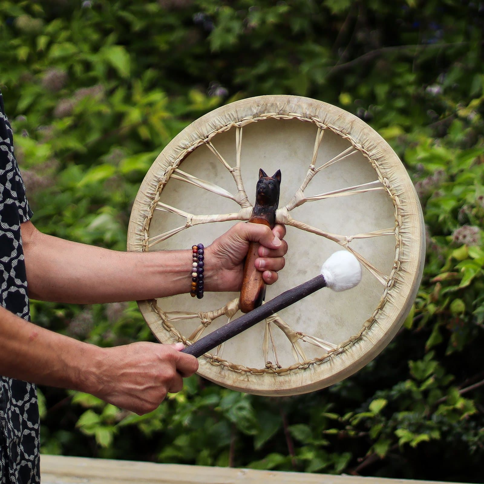 Spirit of the Wolf shaman drum with a carved wolf beater