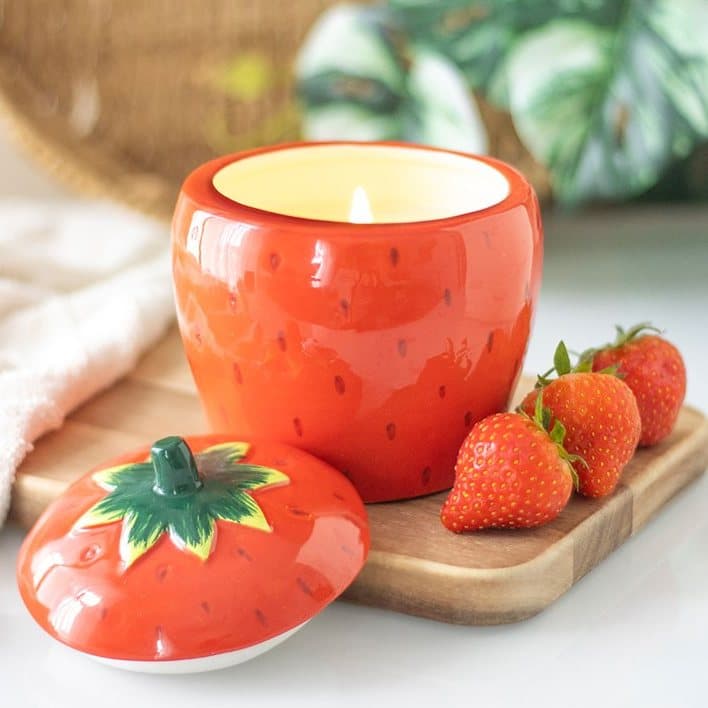 Ceramic scented candle jar shaped like a strawberry