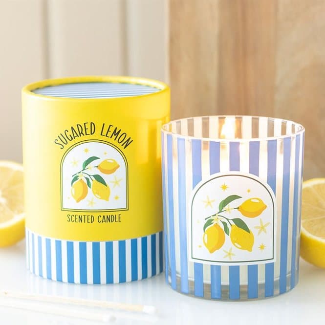Sugared Lemon scented candle in a striped blue glass jar with colour cardboard box