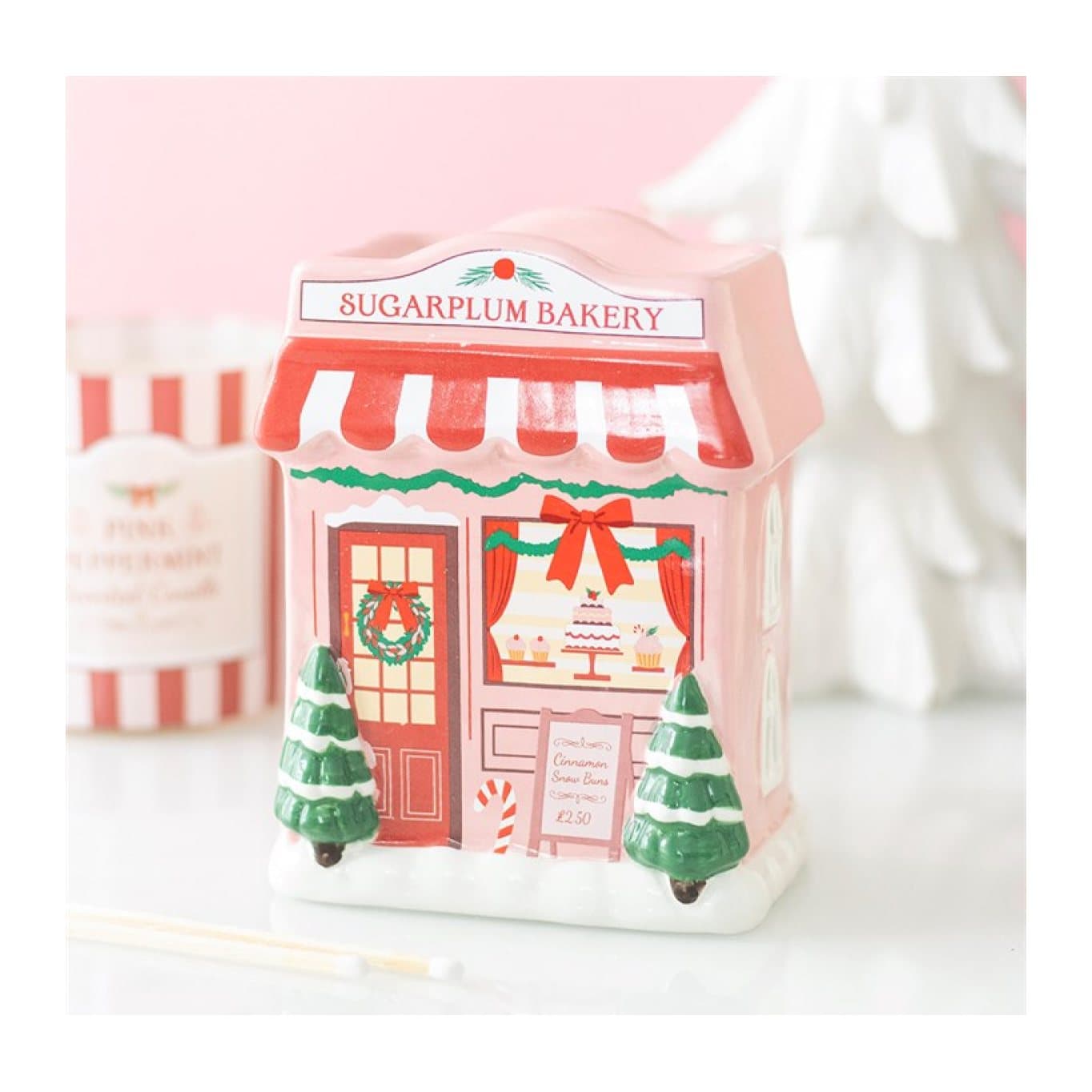 Ceramic Sugarplum Bakery oil burner styled as a Candy Cane Bakery