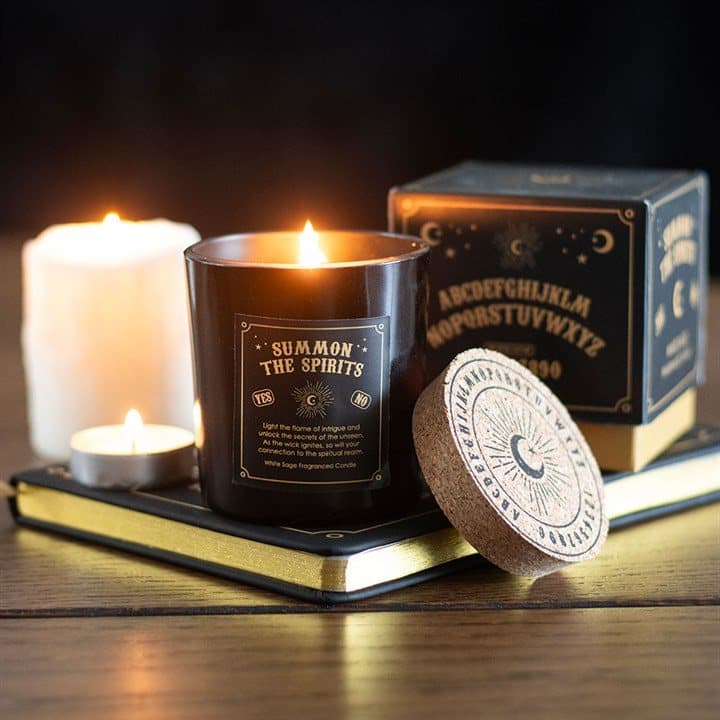 White sage candle in glass with spirit board inspired design