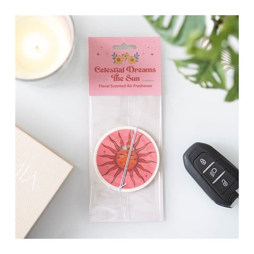 Celestial sun floral scented paper air freshener on a cardboard back