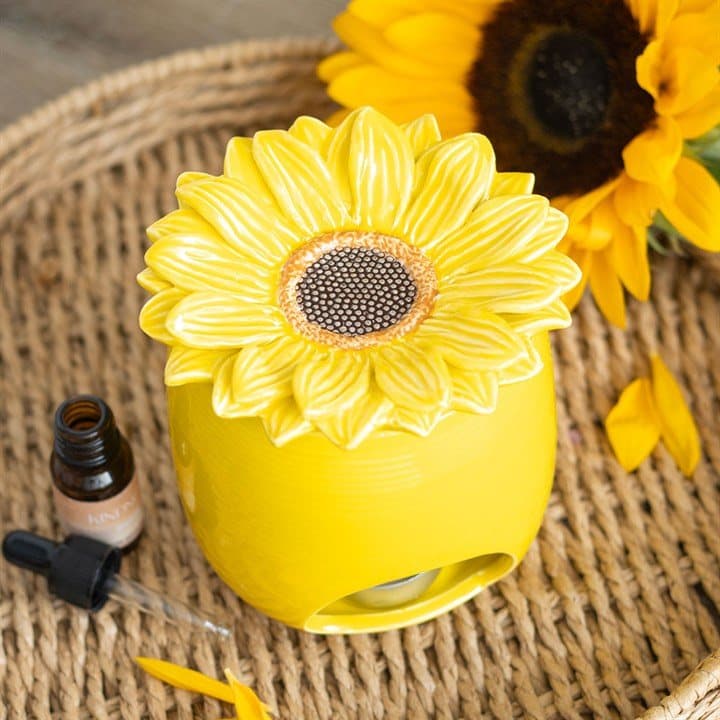 Yellow ceramic oil burner and wax warmer with a sunflower design