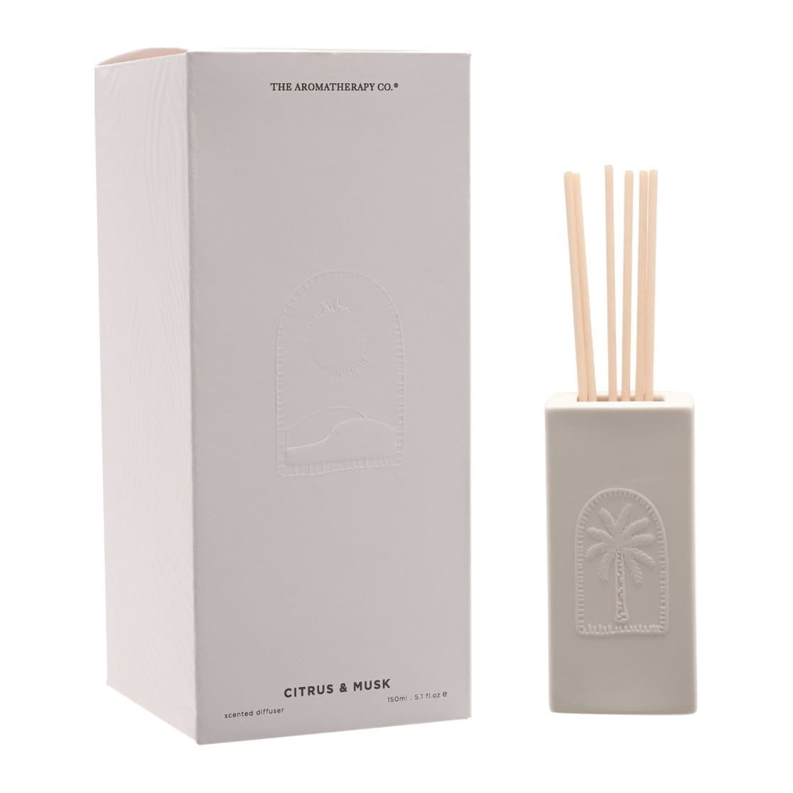 White ceramic diffuser holder with embossed palm tree design and reed sticks