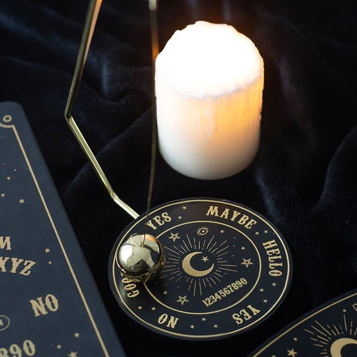 Steel talking board decision maker with a gold-tone spherical pendulum