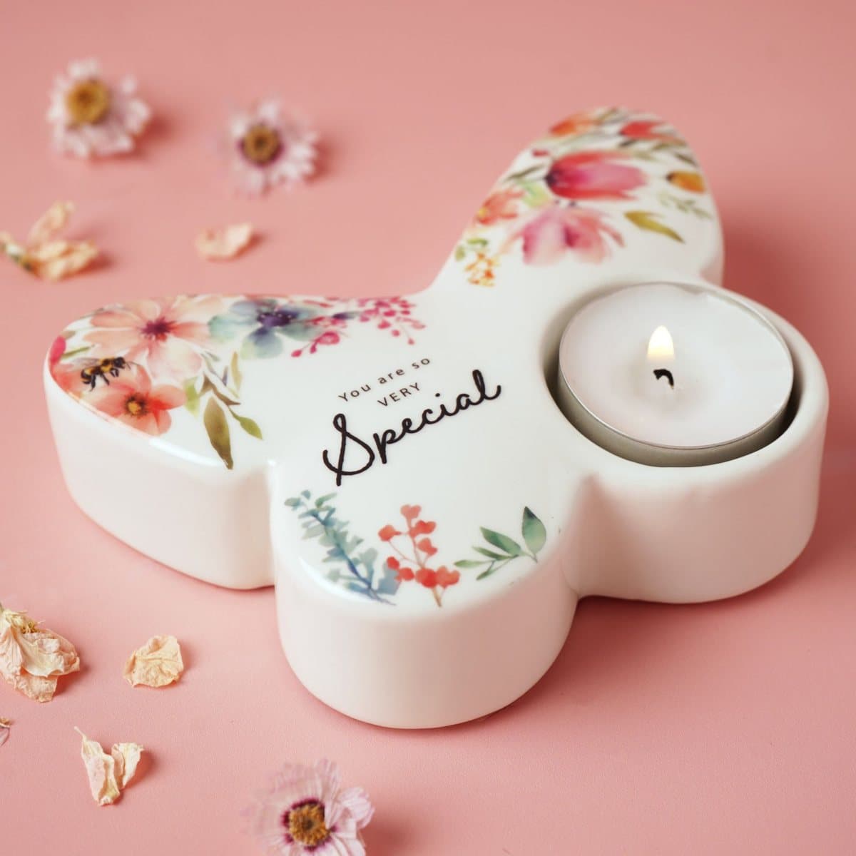 Ceramic butterfly tealight holder with colourful floral detail