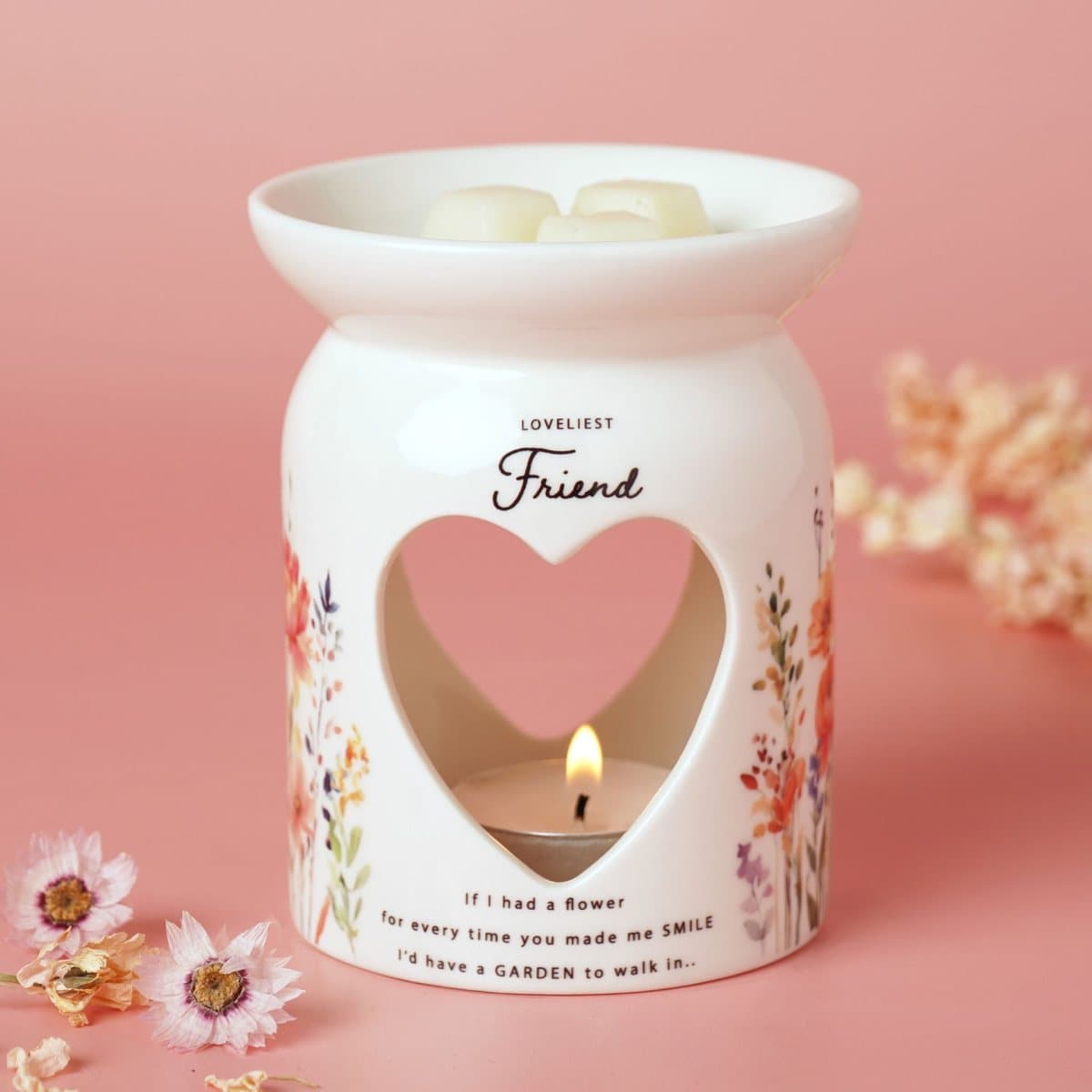 Ceramic wax melt burner with a heart cut-out and floral design titled Friend