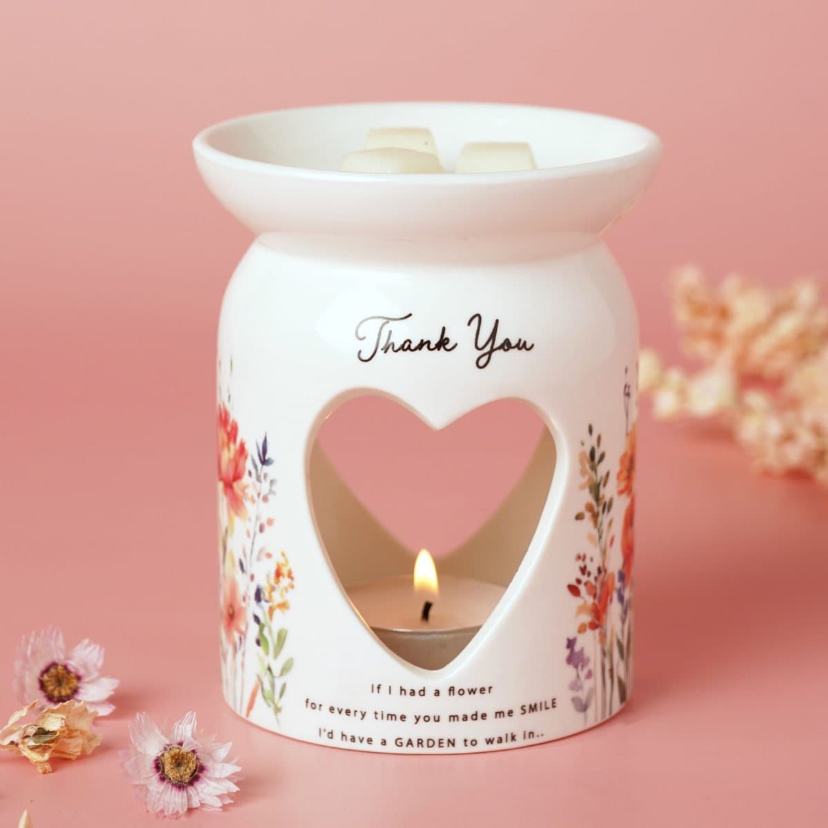 Ceramic wax melt burner with a heart cut-out and floral design titled Thank You