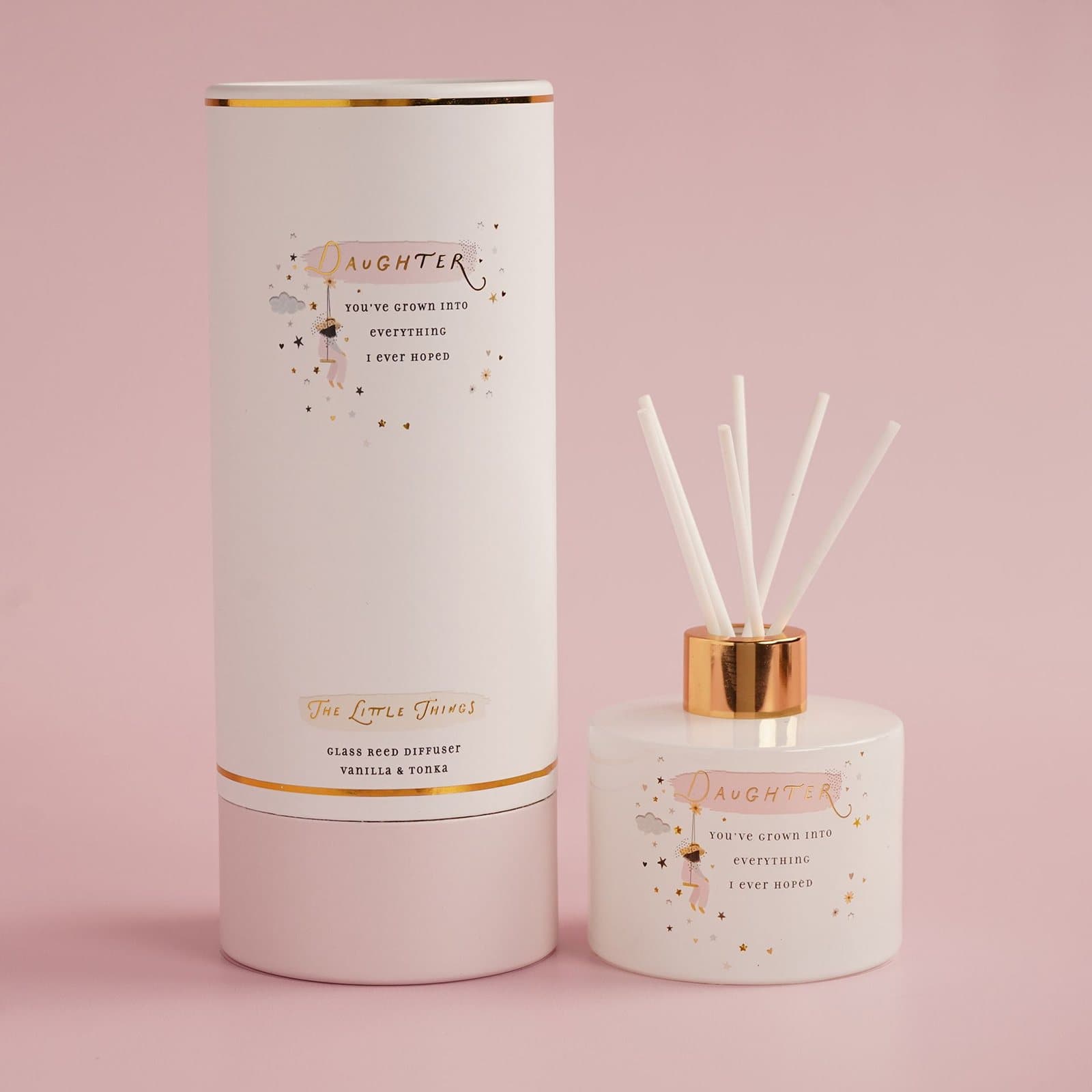Glass reed diffuser with a daughter message beside its cylindrical gift box