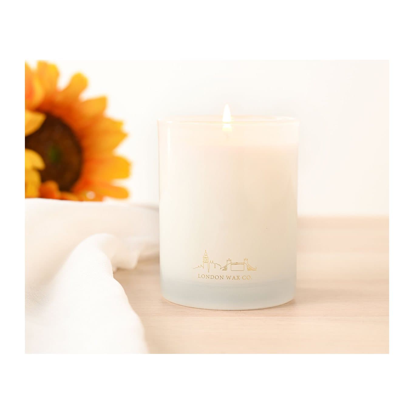 Floral Fields 1 wick glass candle packaged in a floral design